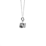 Load image into Gallery viewer, Silver necklace with a pendant on a white background
