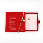 Load image into Gallery viewer, "Le Sans Blague" Cup from The French Dispatch and packaging on white background
